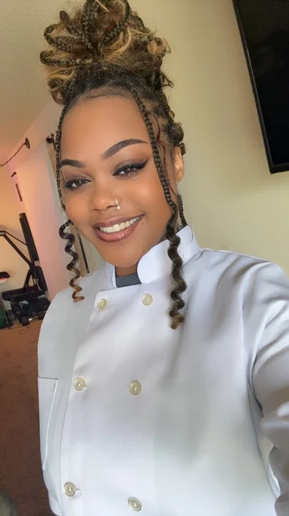 Curvy chef serving Heat in and Out of the Kitchen