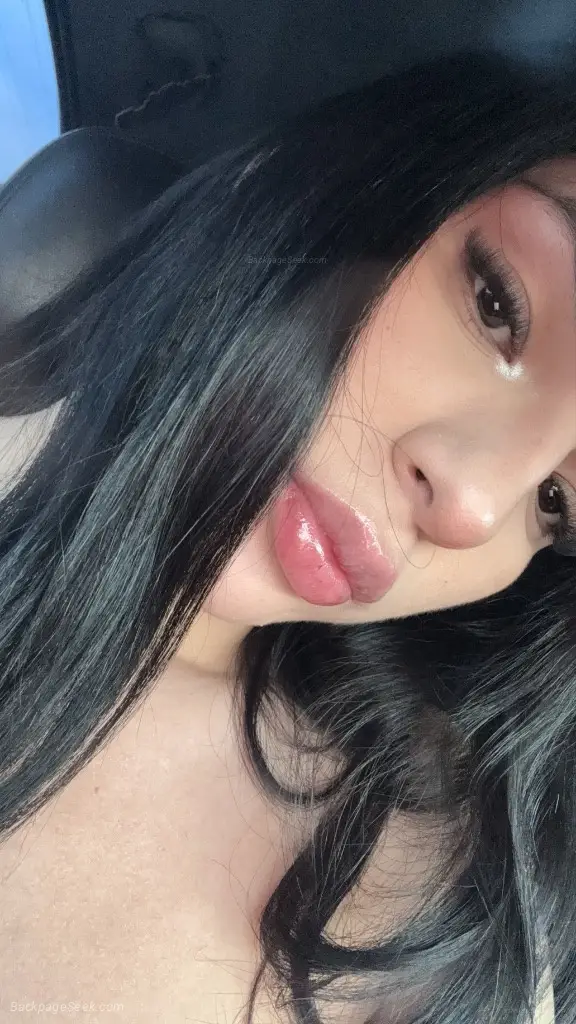 I am a beautiful, slender white girl with long black hair and a pretty